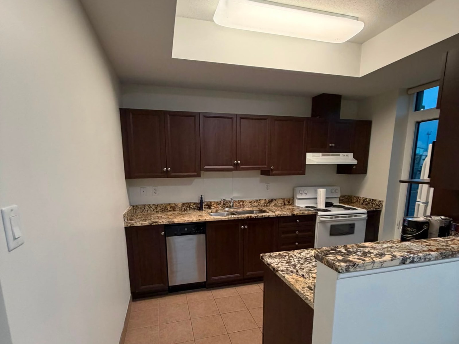 Open-Concept Condo Refinish before